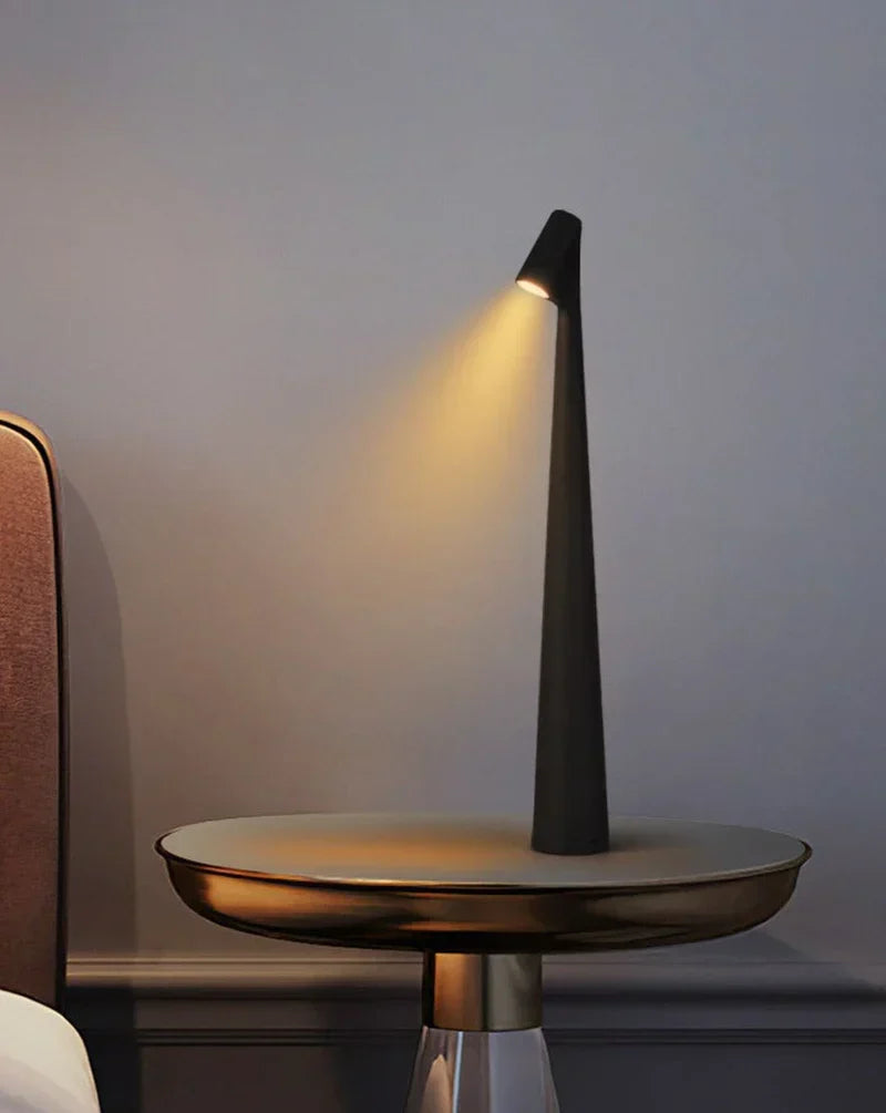 Vibrant Red LunaLite portable LED table lamp. Wireless, rechargeable accent light for modern home decor.
