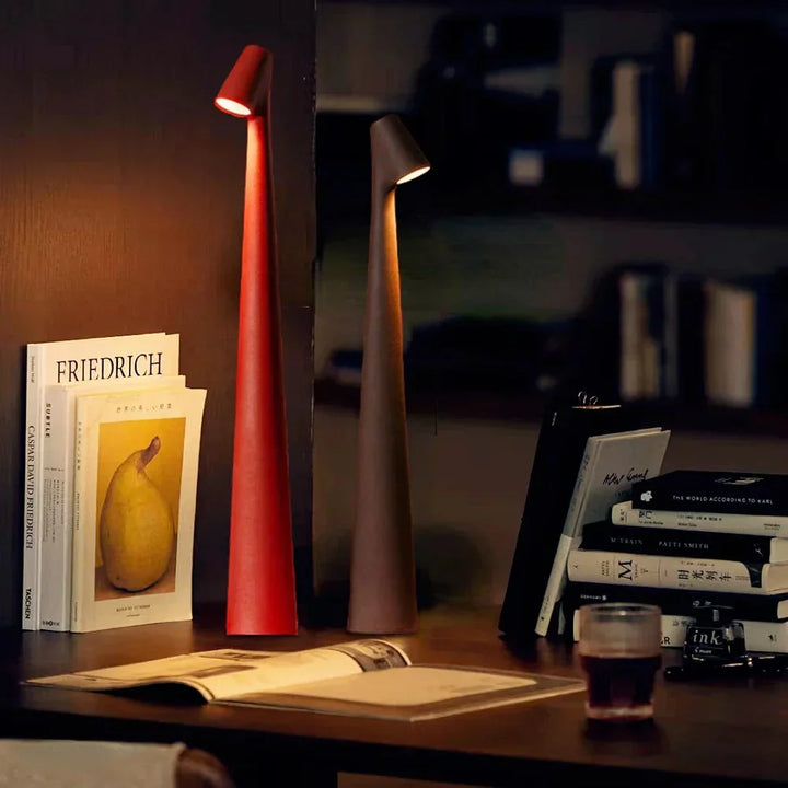 Minimalist White LunaLite wireless table lamp. Portable LED accent light, rechargeable for modern home decor.
