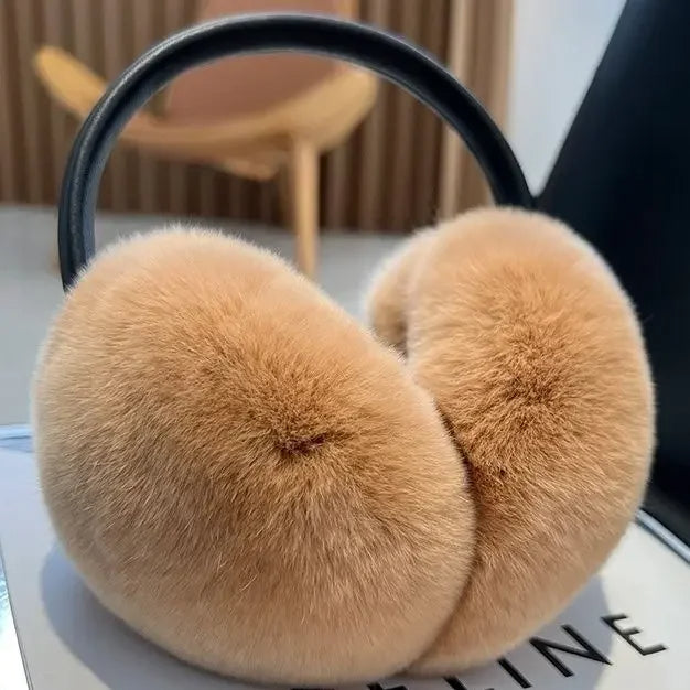 Luxe women's faux fur earmuffs, plush & soft. Perfect winter accessory for warmth & style in cold weather.