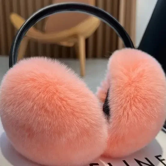Plush faux fur earmuffs for women. Soft ear warmers provide ultimate warmth & comfort for winter fashion.