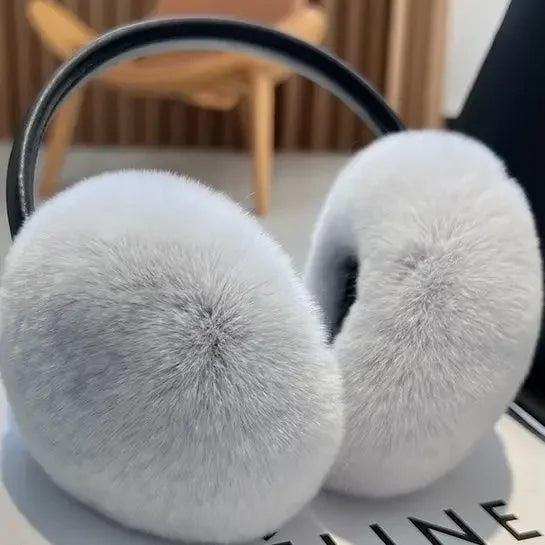 Stylish women's faux fur earmuffs. Luxury soft ear warmers keep you cozy & fashionable in cold weather.