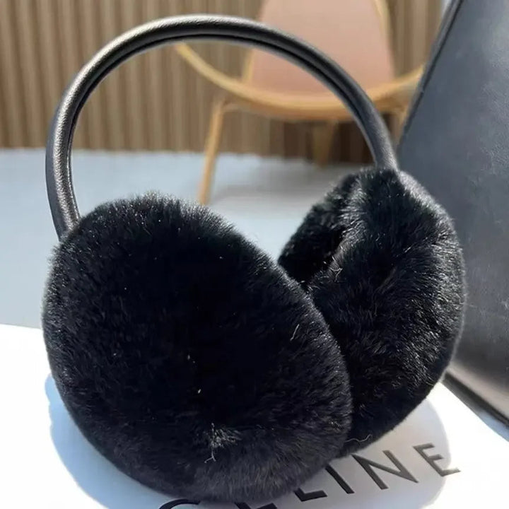 Warm women's faux fur earmuffs. Plush, soft ear warmers for ultimate comfort & winter fashion in cold weather.
