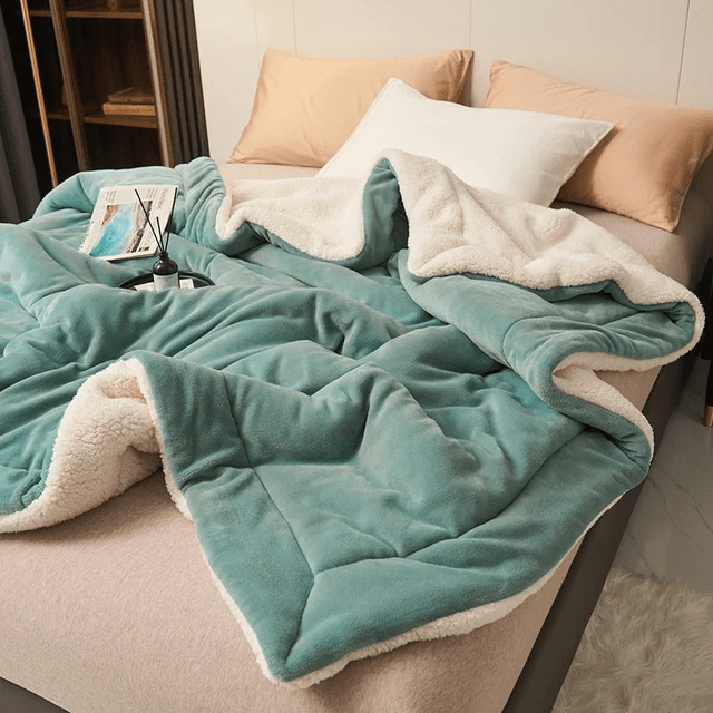 Plush fleece blanket, incredibly soft & cozy, perfect for snuggling and adding warmth to your home.