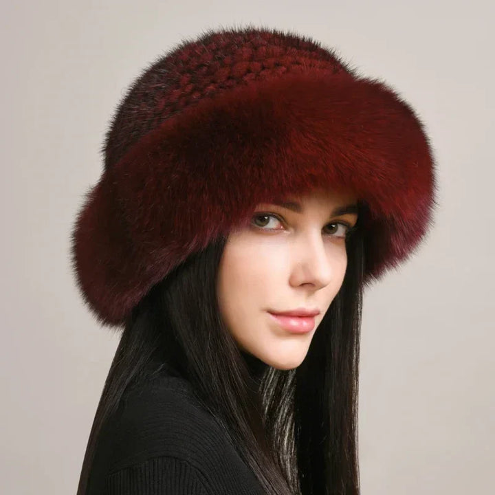 Classic women's fur hat, crafted from genuine mink fur, ideal for a warm and stylish winter fashion statement.