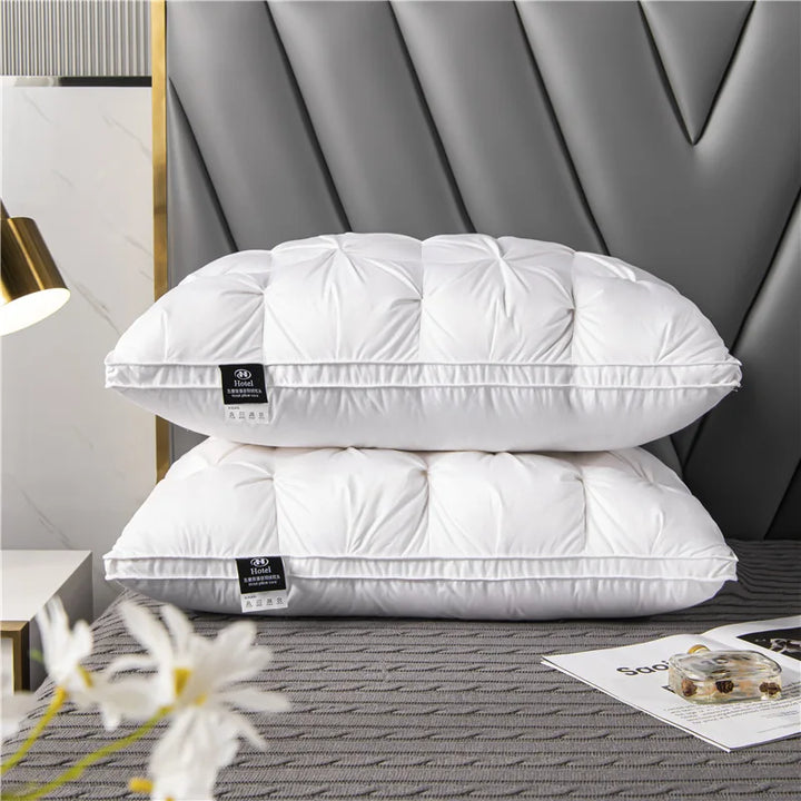 Breathable white goose down pillow, soft & supportive for ultimate sleep comfort. Luxury cotton bedding for home.