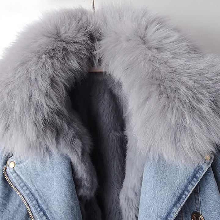 Premium women's winter coat with a soft faux fur collar, fully lined for warmth and sleek, modern style.