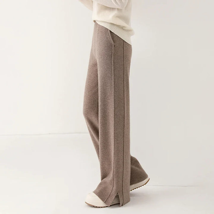 Full-length view of women's luxurious merino wool trousers, showcasing the soft drape and relaxed fit.