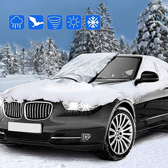 Magnetic car windshield cover as a sun shade. UV protection & heat reduction for vehicle interior.