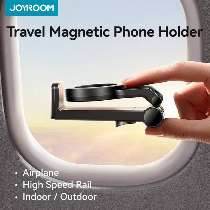 Magnetic travel phone holder securely attached to car vent, compatible with iPhone models, for hands-free navigation