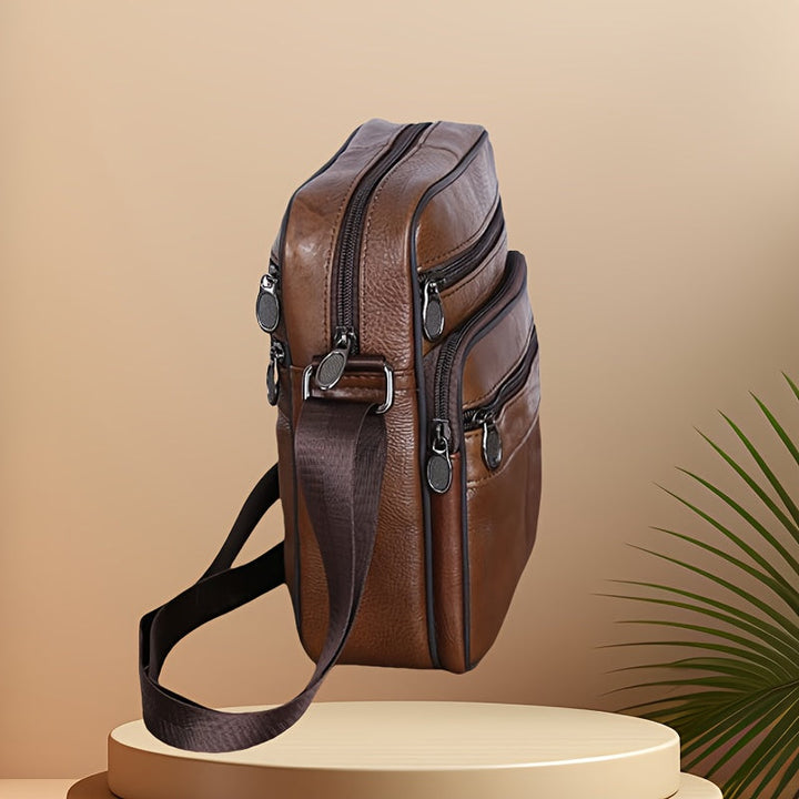 Modern men's shoulder bag, perfect for daily carry, work, or travel. Adjustable crossbody strap ensures comfort.