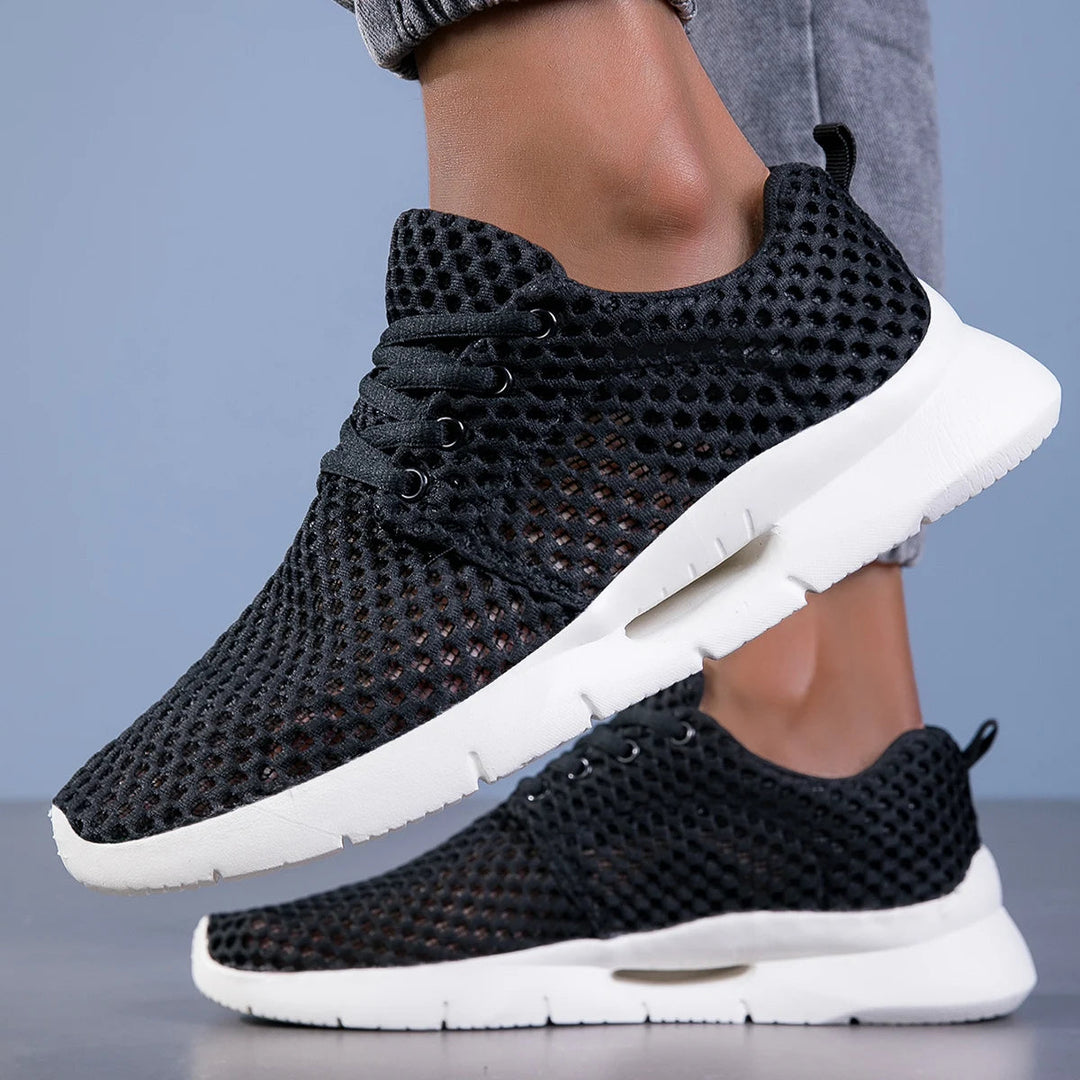 Lightweight men's mesh sneakers for comfort, ideal for running, walking, or training.