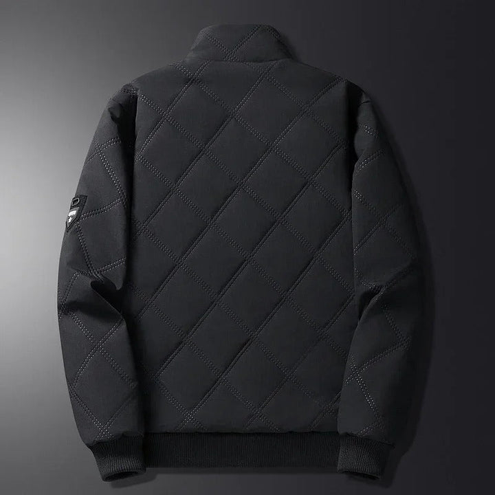 Adventure-ready men's cold weather jacket, windproof & quilted for supreme outdoor comfort.