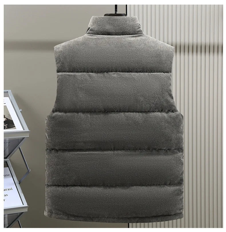 Alpine men's ribbed puffer vest, a versatile layering piece for cold weather outerwear.