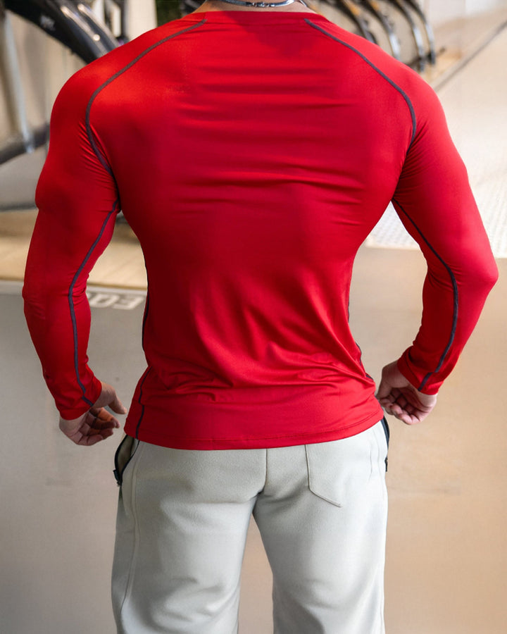Men's active training long sleeve top, shoulder cut, perfect for running & fitness.