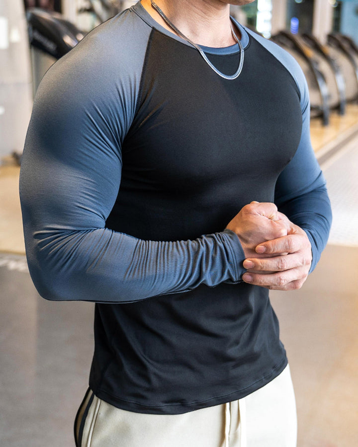 Performance long sleeve men's workout shirt, shoulder cut, for ultimate comfort.