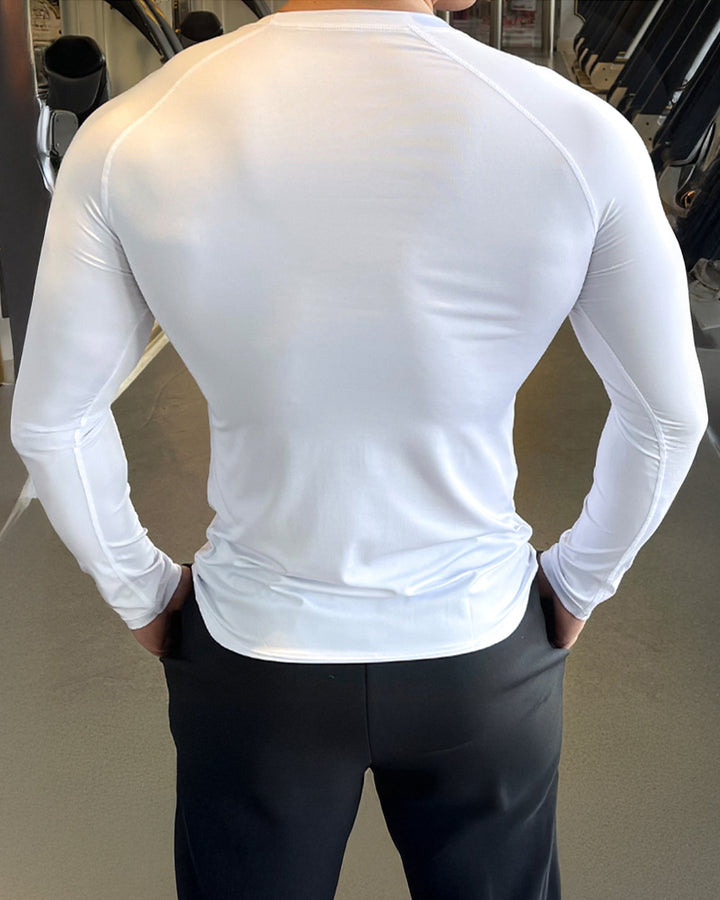 Dynamic men's long sleeve training shirt, shoulder cut, built for active lifestyle.
