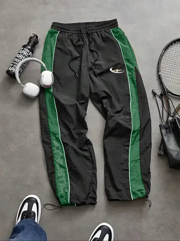 Stylish men's tapered fit track pants. Versatile activewear & sportswear for training or everyday comfort.