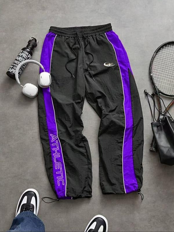 High-performance men's joggers. Athletic pants combining style, comfort, and functionality for various activities.