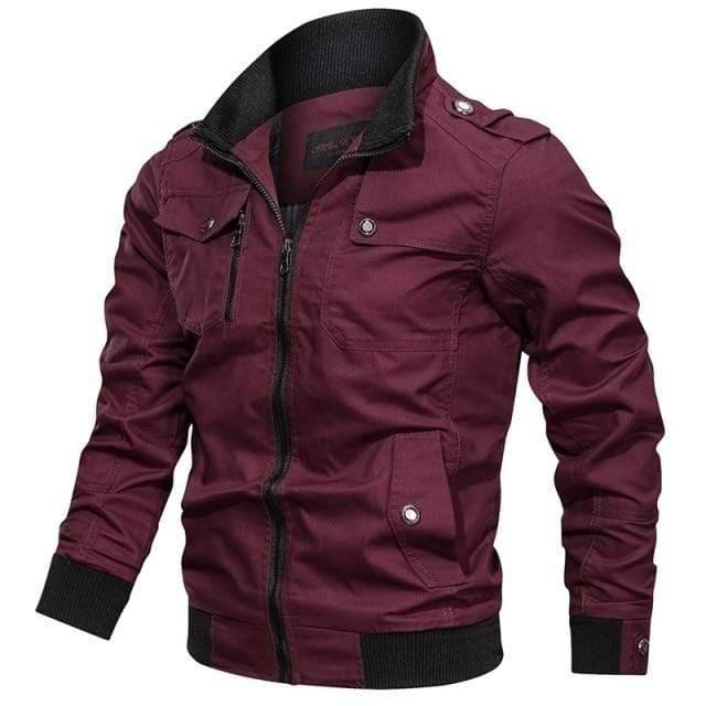 Flat lay of a men's black bomber jacket, cargo pilot style, displaying its full design and versatility
