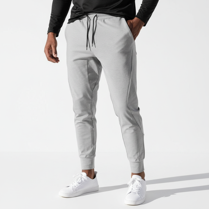 Comfortable black men's sweatpants, Terrence style, with an elastic waist for casual wear & lounging.