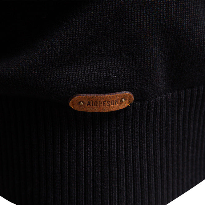 Layering men's navy blue half-zip sweater, featuring distinctive striped accents, a winter essential.