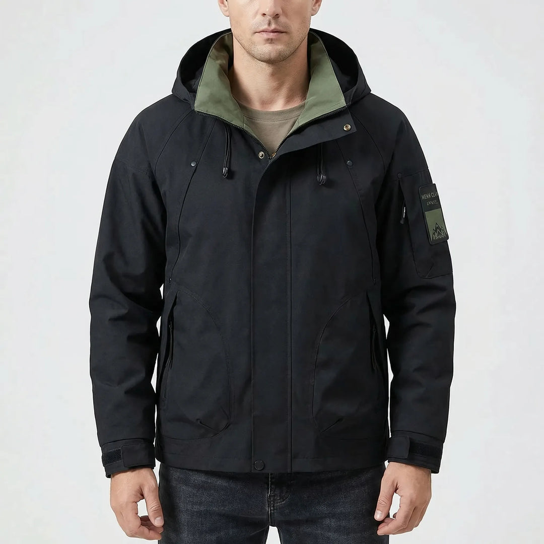 Durable men's hooded softshell windbreaker, water repellent, perfect for hiking and keeping warm outdoors.