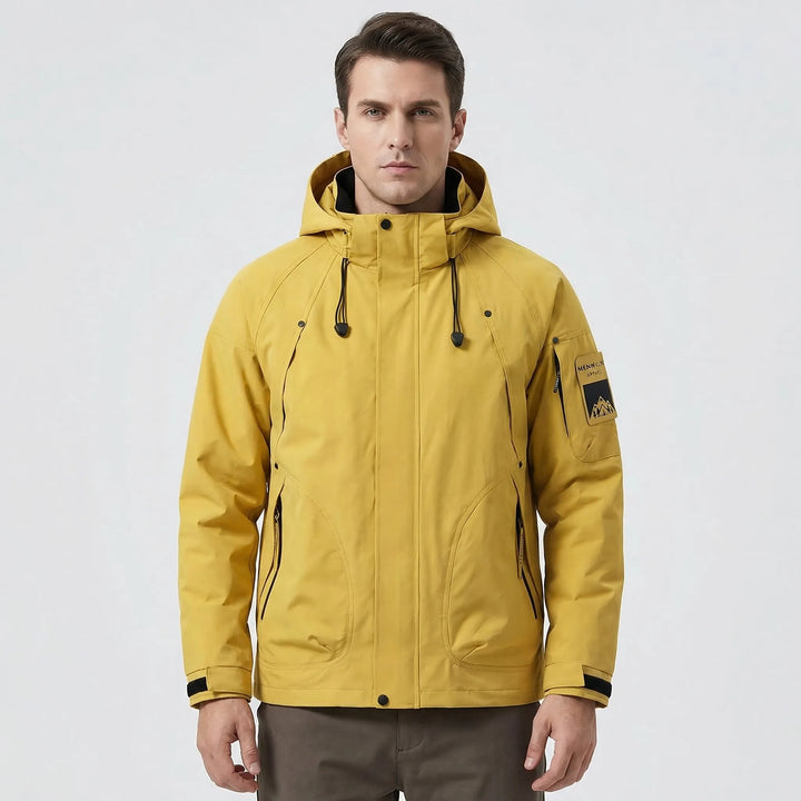Modern men's hooded softshell jacket, a lightweight windbreaker ideal for spring, fall, and casual outdoor style.