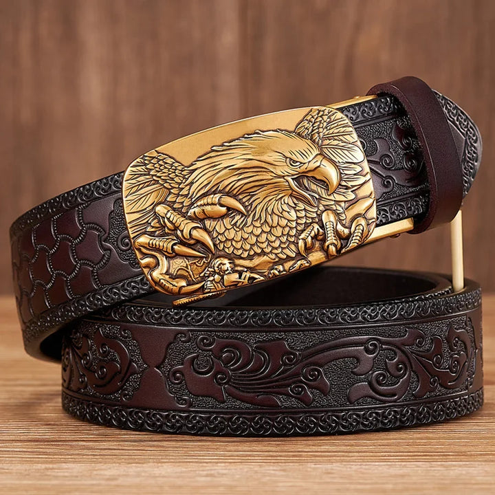 Men's black leather belt with a striking silver eagle buckle, perfect for a bold western-inspired look.
