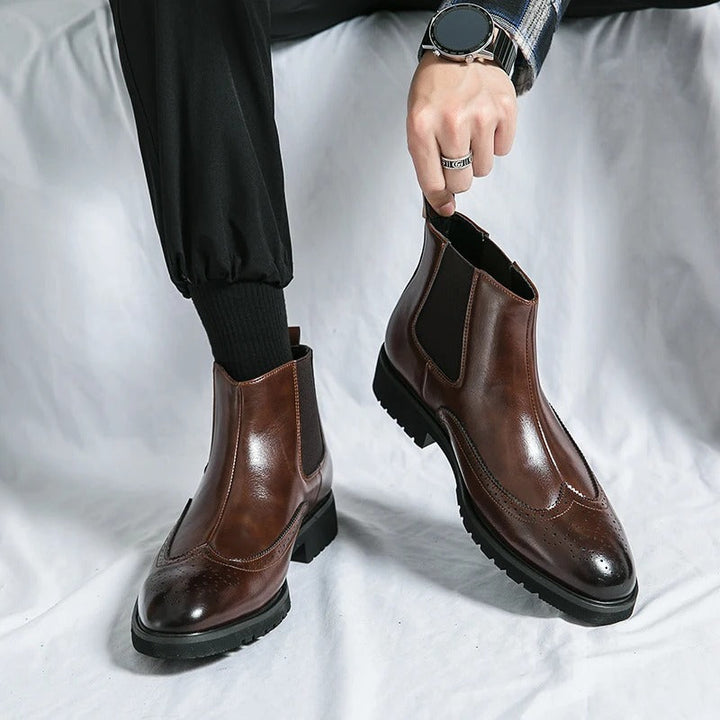 Men's elegant black Chelsea boots, ideal dress boots for sophisticated style and all-day comfort.