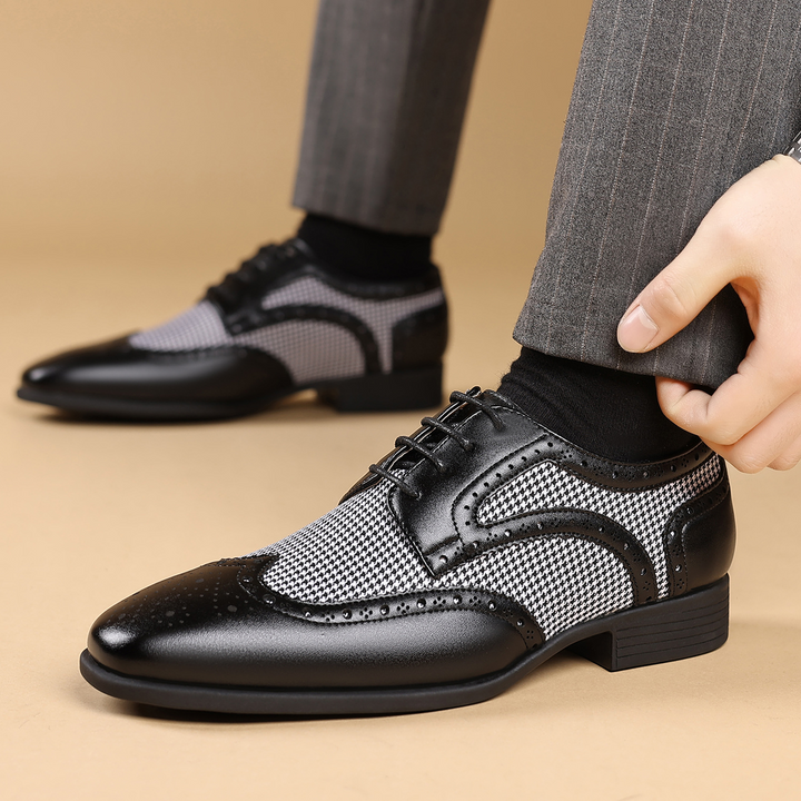 Stylish men's wingtip dress shoes in polished leather, ideal for special occasion and office wear.