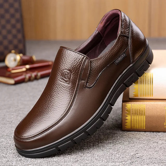 Close-up of men's comfort slip-on loafers, showcasing texture and easy wear design for casual style.