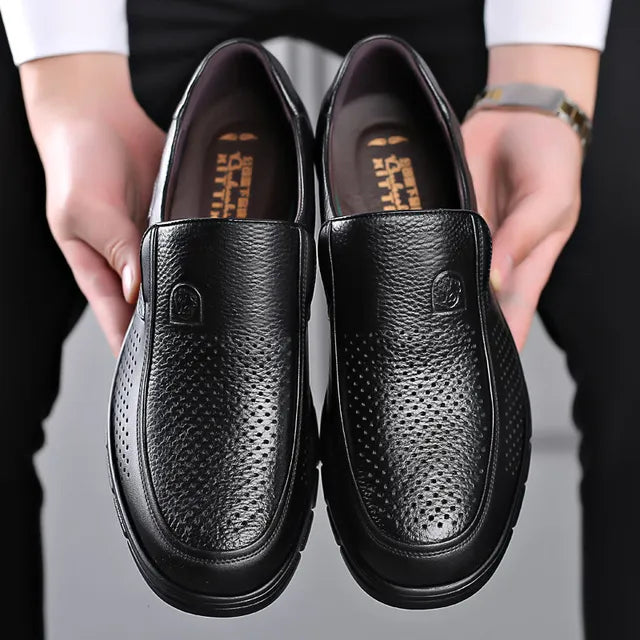 Side view of grey men's slip-on loafers, ideal for everyday comfort and versatile casual footwear.