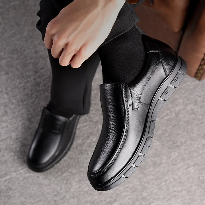 Front view of classic men's slip-on loafers, featuring easy wear design for everyday comfort and style.