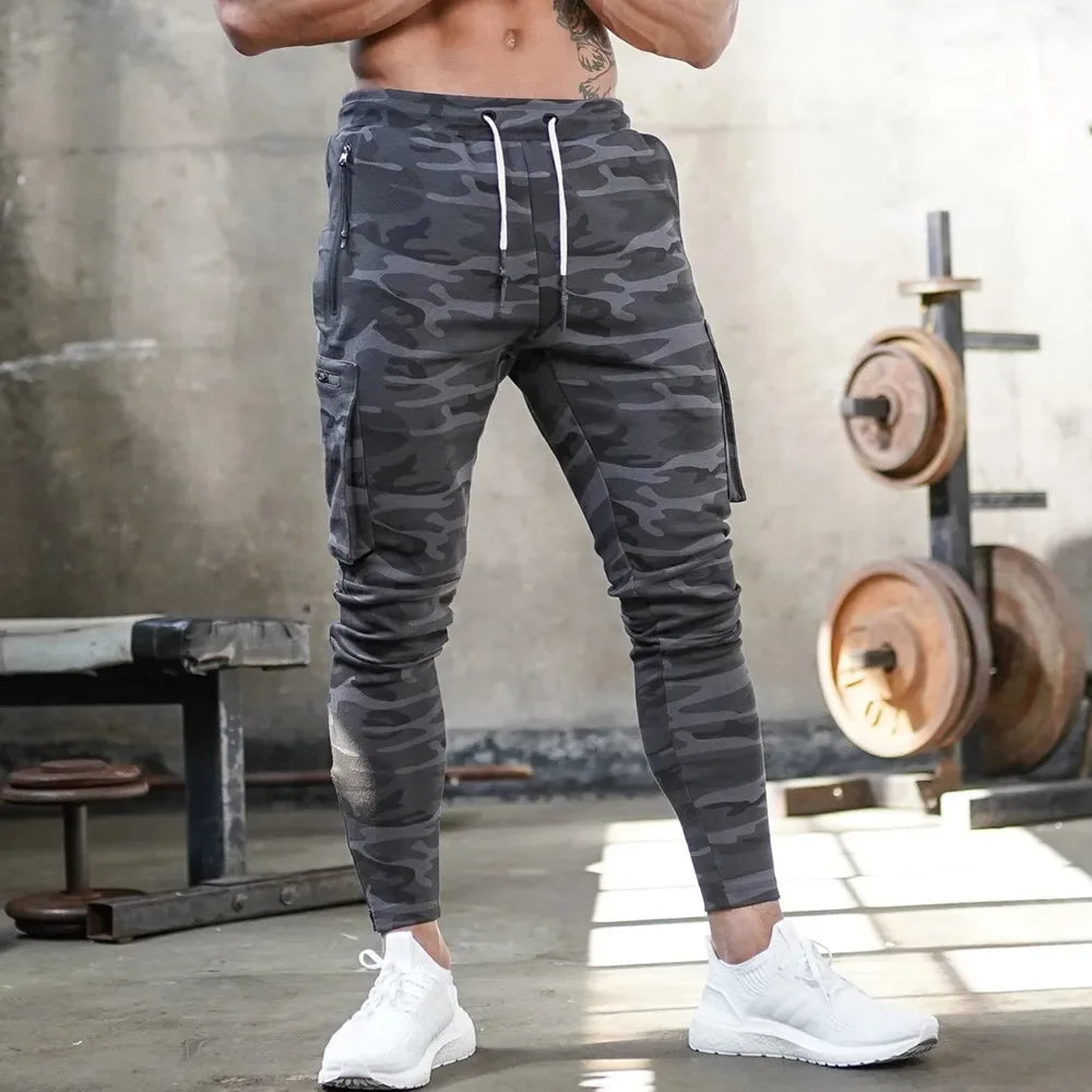 Durable men's workout joggers, cargo pockets, perfect for athletic training & casual wear.