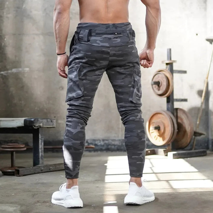 Men's tactical training joggers, sweat-wicking, breathable, essential for active men.