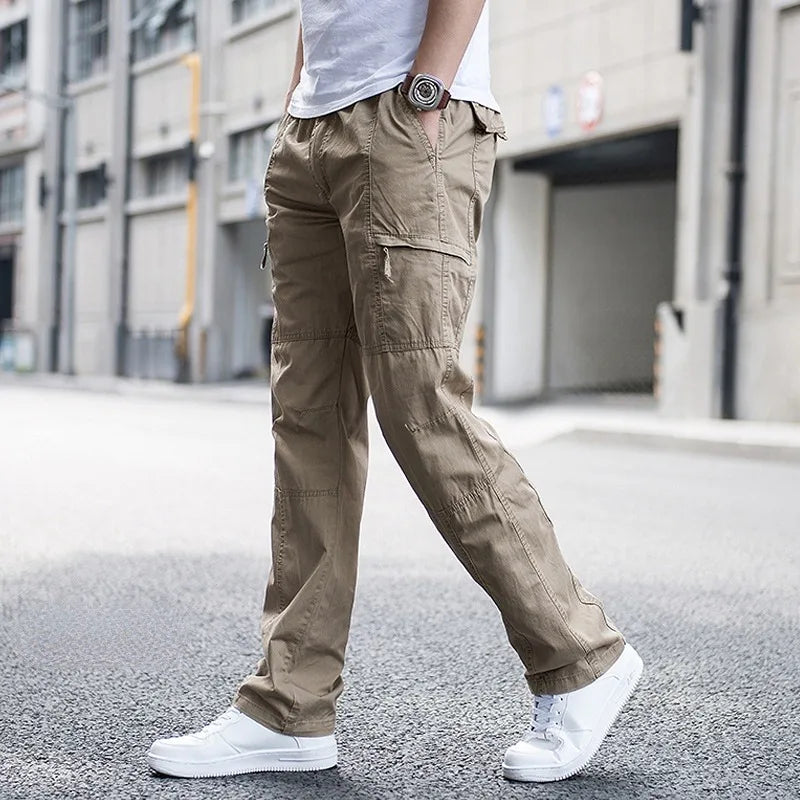 Men's black tech cargo pants with multiple utility pockets, offering comfort and everyday style.