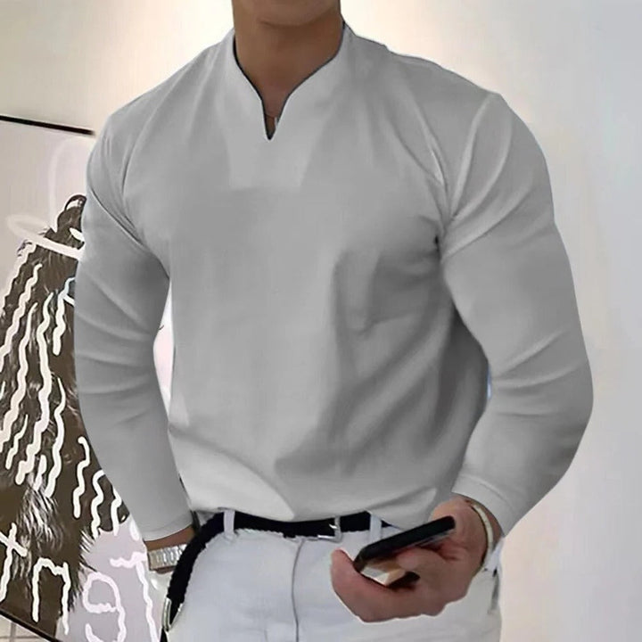 Side view of men's navy V-neck sweatproof shirt, pullover style offering comfort, moisture-wicking & everyday wear.