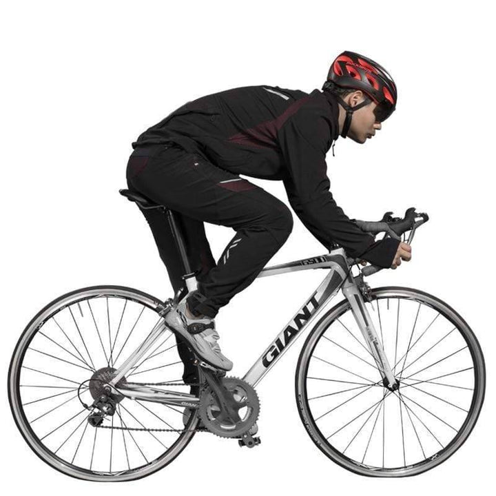 Close-up of the durable fabric and zipper detail on men's outdoor cycling tactical pants, waterproof and activewear.