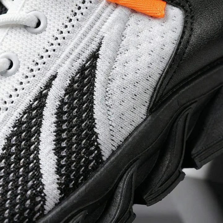 Breathable men's running shoes for ultimate comfort & performance. Lightweight athletic sneakers with cushioned support.