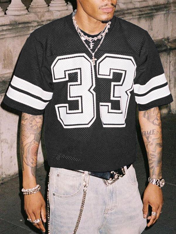Relaxed fit men's jersey, mesh top, combining athletic comfort with streetwear fashion trends.