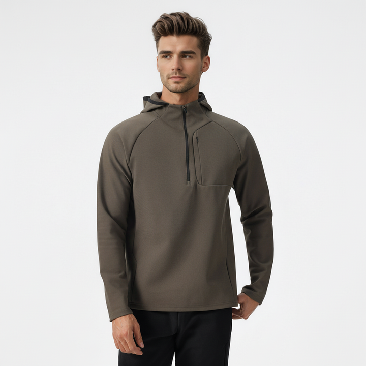 Men's half-zip athletic jacket, breathable & stretchy for superior comfort in active outdoor or indoor sports.