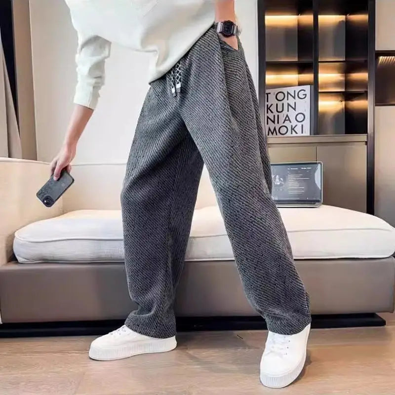 Soft brushed cotton-blend tapered knit pants for men, offering ultimate comfort and relaxed winter style.