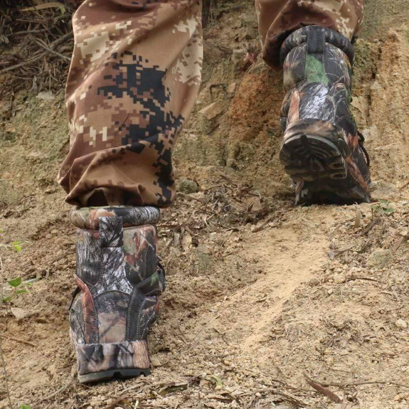 Close-up of men's camouflage tactical hiking boots, showcasing water-resistant fabric and rugged sole