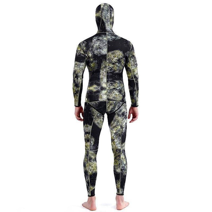 Men's camouflage full wetsuit laid flat, displaying the entire suit and its seams for water sports and diving.