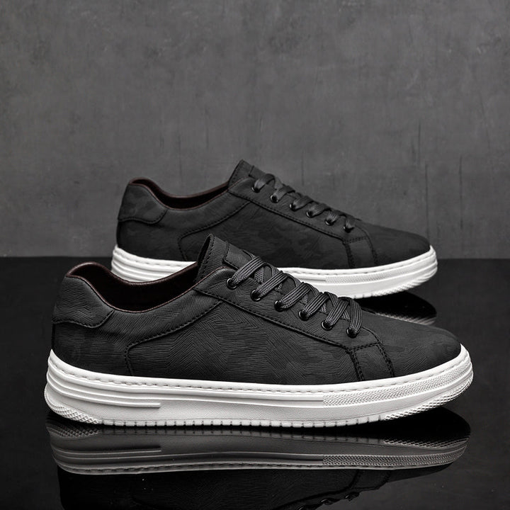 Sleek black Men's Canyon Everyday Sneakers, durable casual footwear for men.
