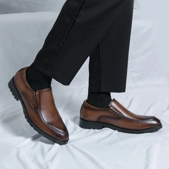 Stylish men's slip-on loafers offering comfort for all-day wear, a versatile casual shoe.
