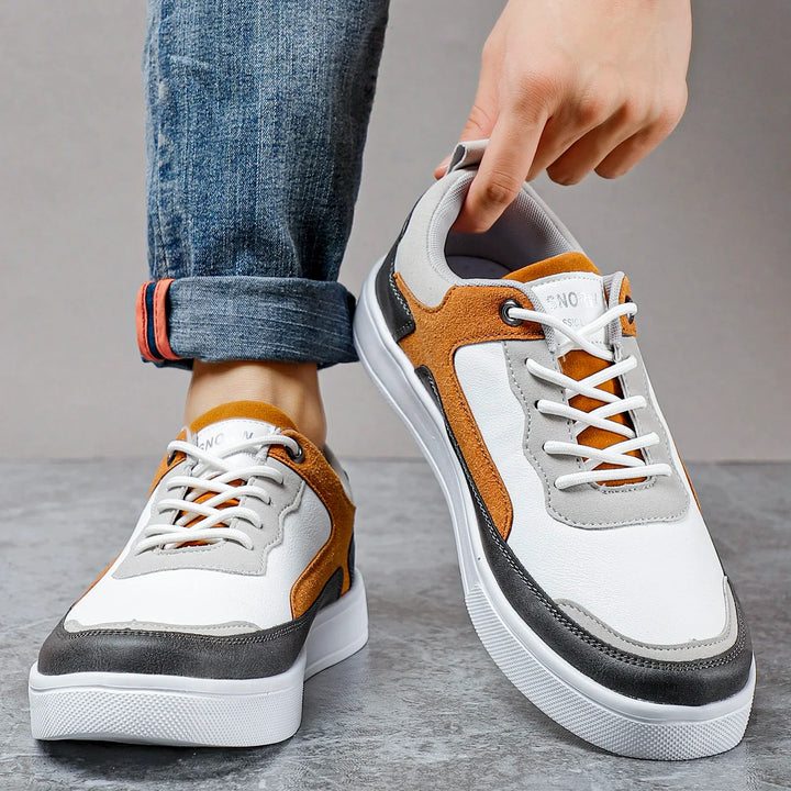 Comfortable men's everyday sneakers with stylish suede accents & practical lace-up closure for casual wear.
