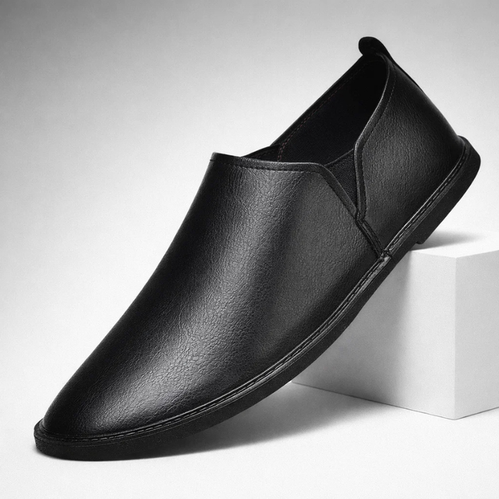 Close-up of men's Chester slip-on loafers, showcasing premium material & classic design.