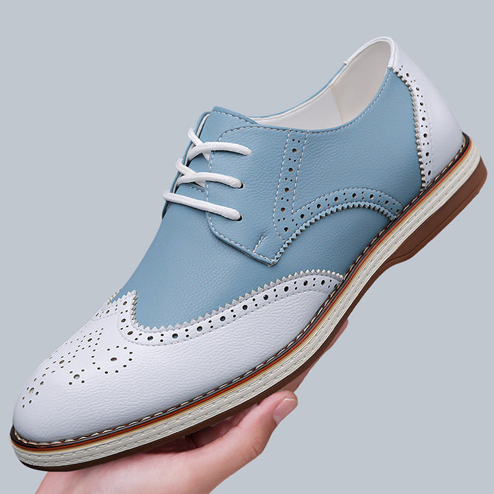 Stylish men's brogues, classic design with intricate perforations for a sophisticated formal look.