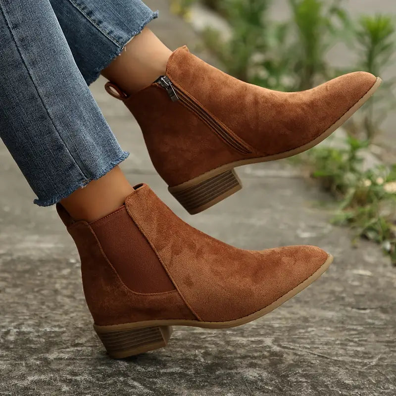Men's classic brown leather Chelsea boots, ideal for versatile everyday casual or formal wear. Durable pull-on ankle boots.